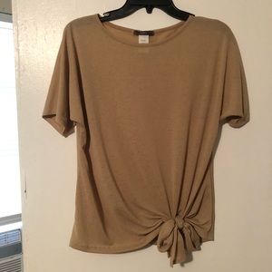 Tan top that ties in the front off to the side